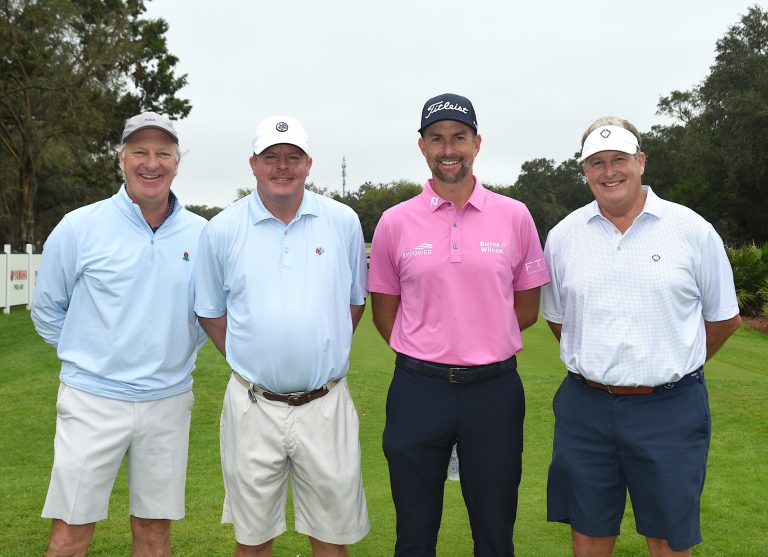 Webb Simpson et al. posing for a photo