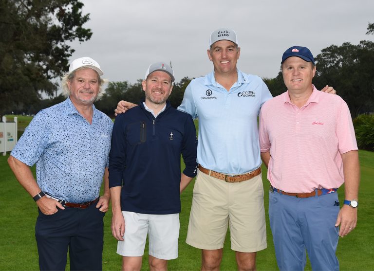 Brendon Todd et al. posing for a photo
