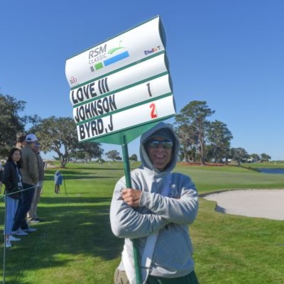 a person holding a sign