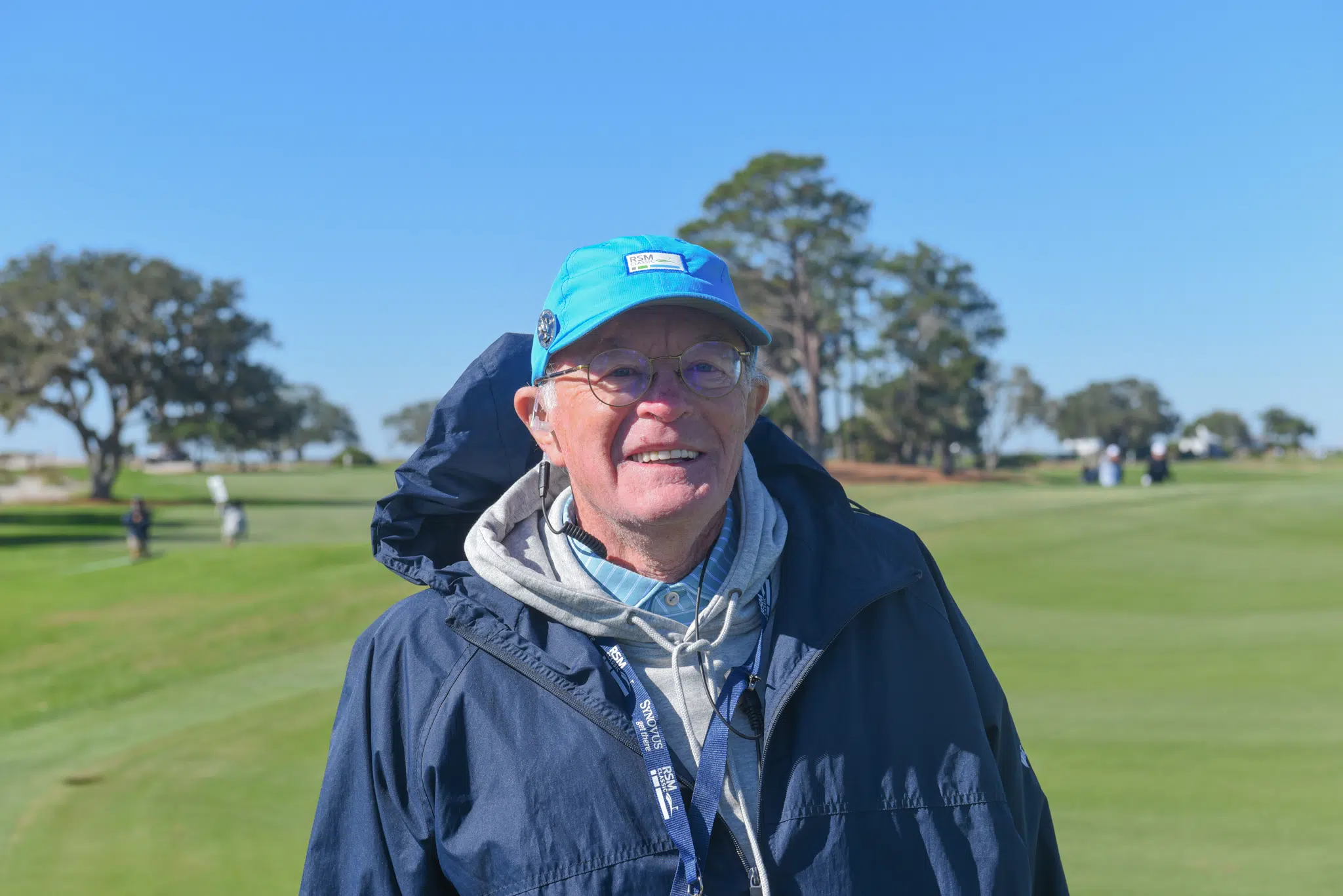 a man wearing a blue hat